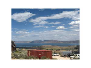 View of mountain backdrop with a large body of water