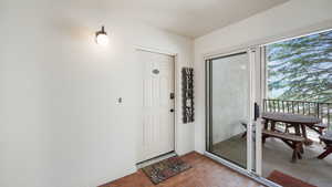 Property entrance featuring a balcony