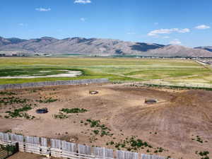 View of mountain backdrop featuring rural landscape