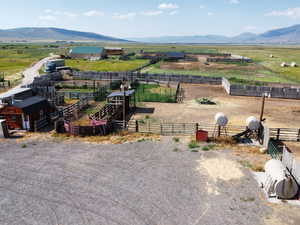 Aerial view of sparsely populated area featuring a mountainous background