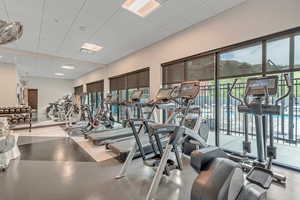 Workout area featuring a paneled ceiling