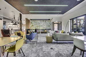 Living area featuring carpet floors