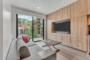 Living room featuring light wood-style flooring