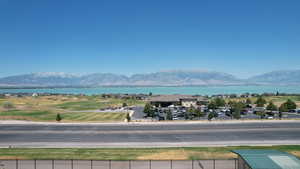 Mountain view featuring a nearby body of water