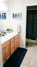 Bathroom featuring double vanity