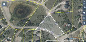 Aerial map of property and surrounding area with property boundaries highlighted