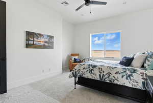 Bedroom featuring carpet flooring and ceiling fan