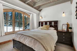 Bedroom with carpet and wooden ceiling