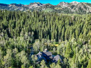 View from above of property featuring a mountainous background
