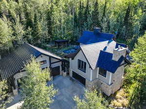 View from above of property featuring a forest
