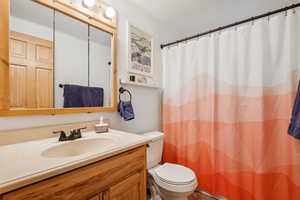 Bathroom featuring vanity and a shower with curtain