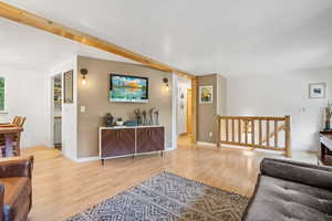 Living room featuring light wood-style flooring