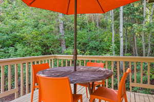 Wooden deck with outdoor dining area