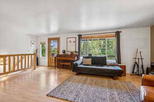 Living room featuring wood finished floors