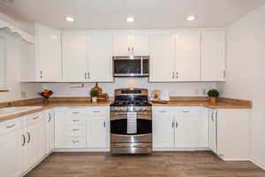 Lots of White Cabinets and Counter Tops for Storage and Work Space!