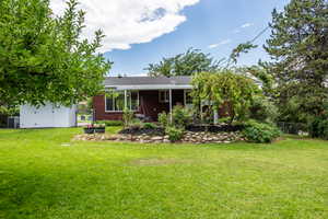 Beautiful Flowers and Trees surround the Covered Patio! So Lovely and Quiet!