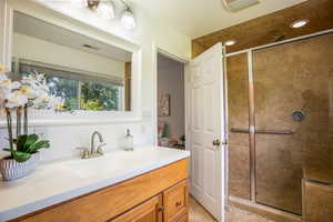 Ensuite Bathroom is remodeled with a Large Vanity, Custom Tile Walk-in Shower, Linen Closet and Luxurious Radiant Heat in the Floors!