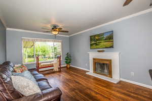 Spacious Family Room with Hardwood Floors and Cozy Fireplace!