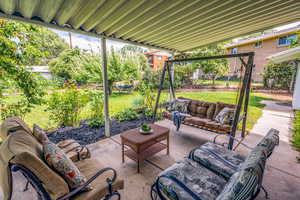 What a Lovely Place to sit and visit with Family and Friends in your Shady Covered Patio!