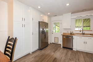 Wall of Pantry Cabinets for Amazing Storage! Stainless Steel Refrigerator is INCLUDED, Along with the Washer and Dryer!