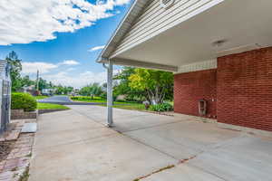 Newly Painted Carport Ceiling and Connected Storage Closet! RV Parking Pad is 35 feet long!