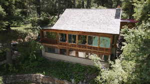 View of side of home with a chimney