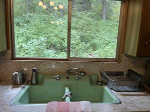 Bathroom featuring a tub