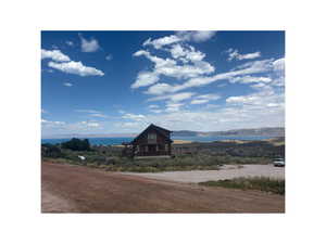 View of mountain backdrop with a nearby body of water