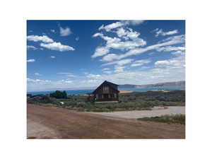 Mountain view featuring a large body of water