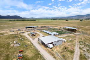 Aerial View of Ranch Amenities - Shop with Living Quarters, Hay Barn, Corral, Well, etc.