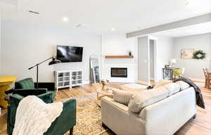 Lower level family room, high ceilings, walk out basement, electric fireplace