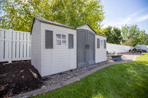 Storage shed included