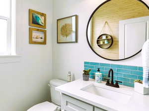 Half bath on the main with a pop of color