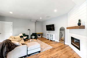 2nd view of lower level family room with storage below the front porch