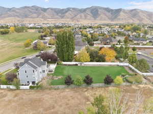 Drone / aerial view of a mountainous background to the east