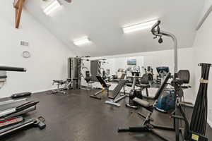 Gym with vaulted ceiling