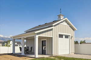 Detached toy garage in backyard