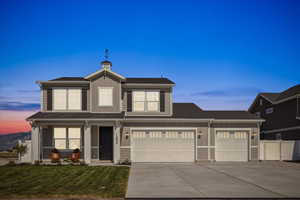 View of front of home at night.