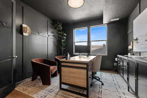 Moody office with custom trim work