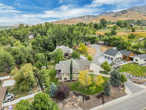 Aerial view of residential area featuring mountains