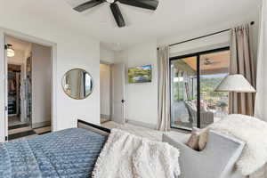 Bedroom with access to outside and a ceiling fan