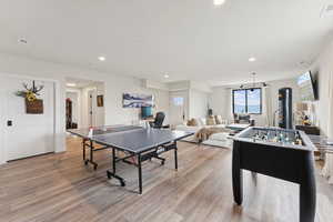 Rec room featuring recessed lighting and light wood-style flooring
