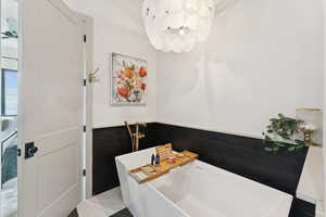 Full bath featuring a freestanding tub