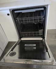 Kitchen view of dishwashing machine