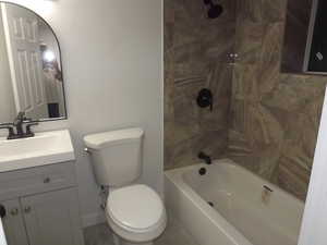 Full bathroom featuring vanity and shower / tub combination