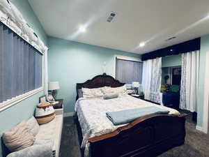 Bedroom with carpet and recessed lighting