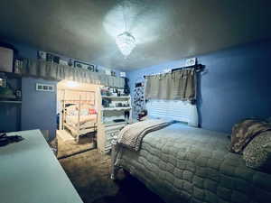 Carpeted bedroom #2 in the middle