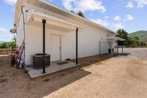 View of outbuilding featuring a mountain view