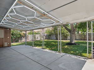 Covered patio with unique light fixture