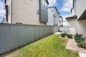 View of yard featuring a residential view and a patio area